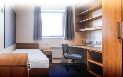 University of Surrey moves from local to central control